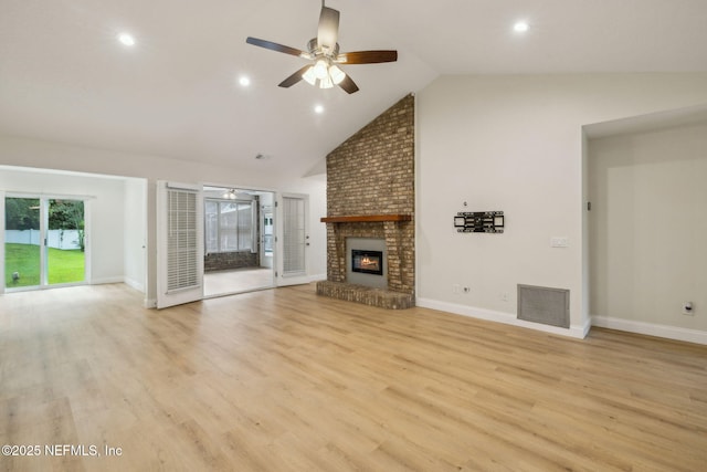 4804 Winton Cir, Saint Augustine, FL 32086 - unfurnished living room with ceiling fan, a fireplace, recessed lighting, light wood-type flooring, and high vaulted ceiling