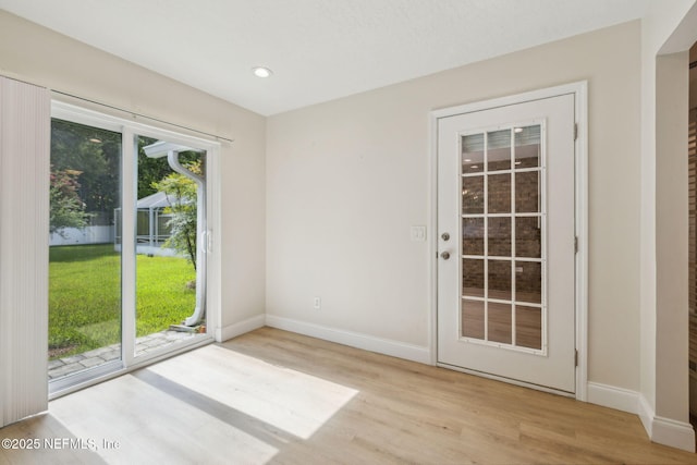 4804 Winton Cir, Saint Augustine, FL 32086 - entryway featuring light wood-style flooring and recessed lighting