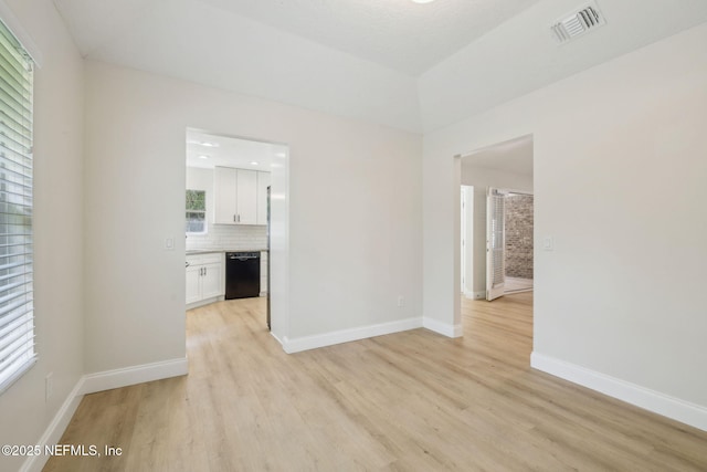 4804 Winton Cir, Saint Augustine, FL 32086 - unfurnished living room with light wood-style flooring and baseboards