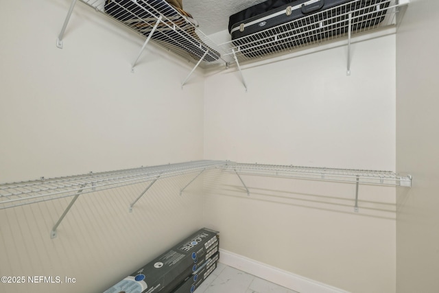 4804 Winton Cir, Saint Augustine, FL 32086 - spacious closet with light marble finish floors
