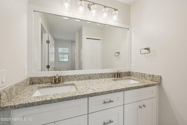 4804 Winton Cir, Saint Augustine, FL 32086 - full bathroom with double vanity and toilet