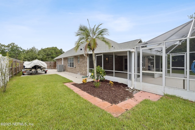 4804 Winton Cir, Saint Augustine, FL 32086 - fenced backyard with a patio and a lanai