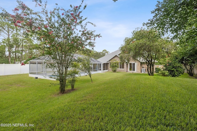 4804 Winton Cir, Saint Augustine, FL 32086 - fenced backyard with a lanai