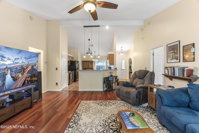 1133 Blue Sky Way, Jacksonville, FL 32225 - living room featuring ceiling fan, dark wood-style floors, high vaulted ceiling, and arched walkways
