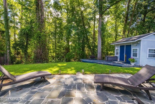 1133 Blue Sky Way, Jacksonville, FL 32225 - view of patio with an outbuilding
