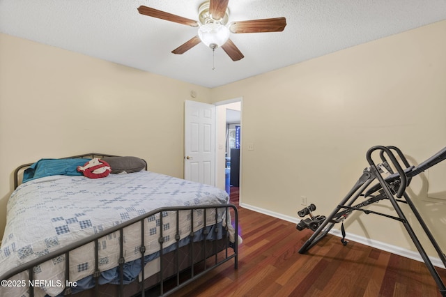 1133 Blue Sky Way, Jacksonville, FL 32225 - bedroom with wood finished floors, ceiling fan, and a textured ceiling