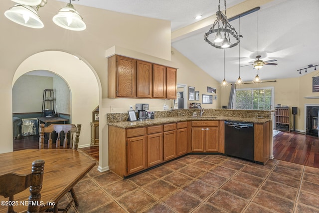 1133 Blue Sky Way, Jacksonville, FL 32225 - kitchen with dishwasher, brown cabinetry, a peninsula, a ceiling fan, and pendant lighting