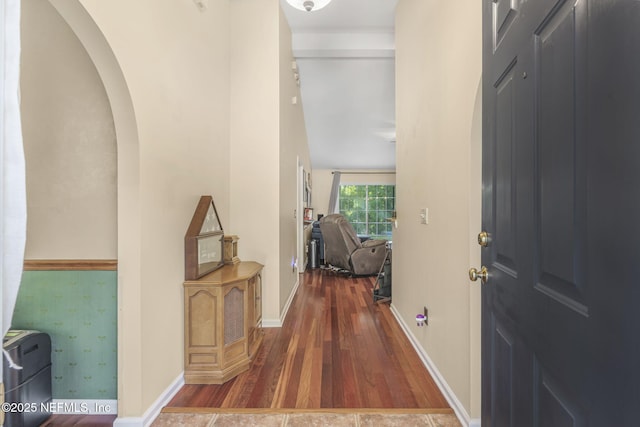 1133 Blue Sky Way, Jacksonville, FL 32225 - foyer entrance featuring wood finished floors and arched walkways