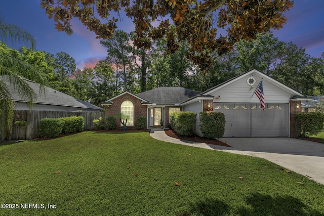 1133 Blue Sky Way, Jacksonville, FL 32225 - ranch-style house featuring brick siding, a garage, and concrete driveway