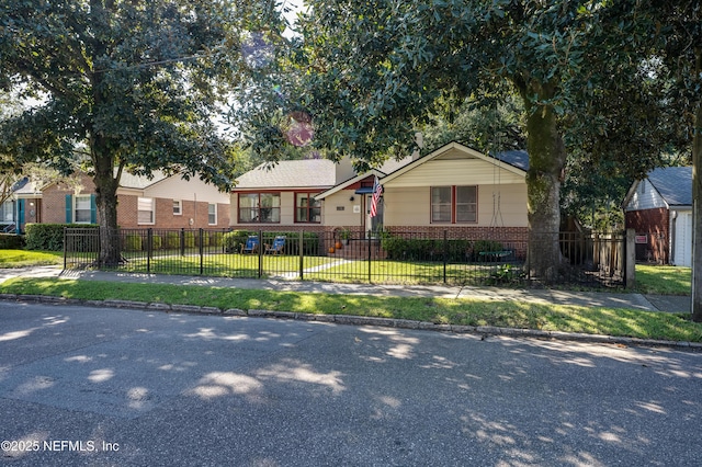 4818 Astral St, Jacksonville, FL 32205 - view of front of home with brick siding and a fenced front yard