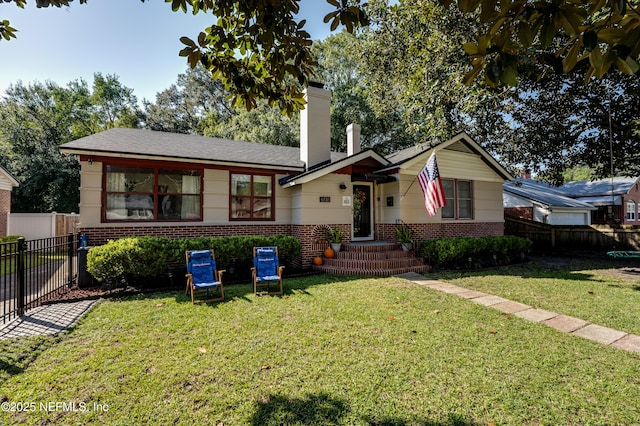 4818 Astral St, Jacksonville, FL 32205 - view of front of home featuring brick siding and a chimney