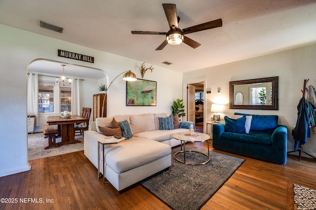 4818 Astral St, Jacksonville, FL 32205 - living room with wood finished floors, ceiling fan, plenty of natural light, and arched walkways