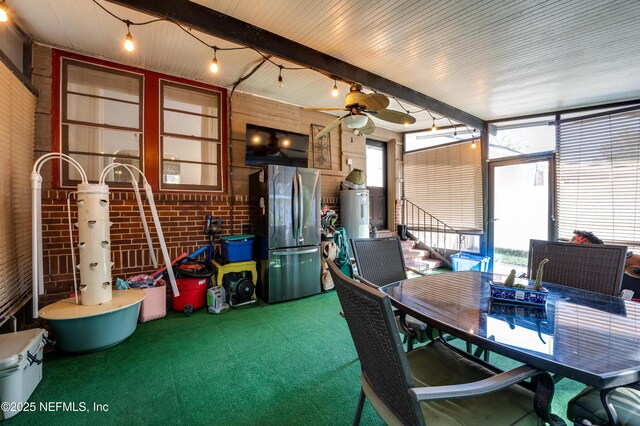 4818 Astral St, Jacksonville, FL 32205 - sunroom with outdoor dining area, a ceiling fan, and water heater