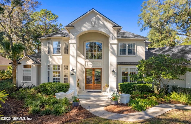 1614 Sheffield Park Ct, Jacksonville, FL 32225 - traditional-style home featuring stucco siding and roof with shingles