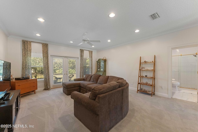 1614 Sheffield Park Ct, Jacksonville, FL 32225 - living room with light colored carpet, ornamental molding, recessed lighting, ceiling fan, and french doors
