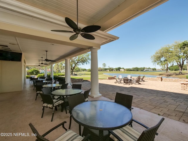 1614 Sheffield Park Ct, Jacksonville, FL 32225 - view of patio featuring outdoor dining area, a ceiling fan, and a water view