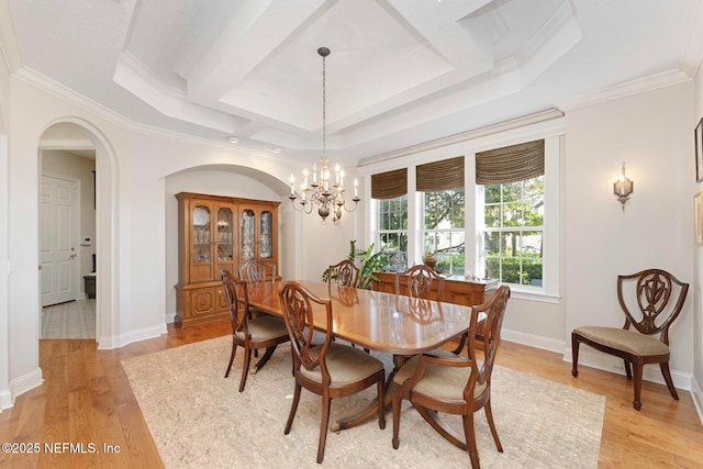 1614 Sheffield Park Ct, Jacksonville, FL 32225 - dining space featuring ornamental molding, light wood finished floors, a chandelier, arched walkways, and coffered ceiling