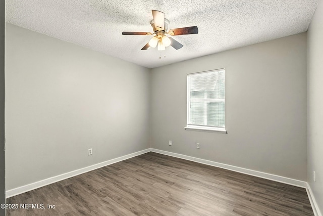 6719 Newgate Cir E, Jacksonville, FL 32244 - spare room with dark wood finished floors, ceiling fan, and a textured ceiling