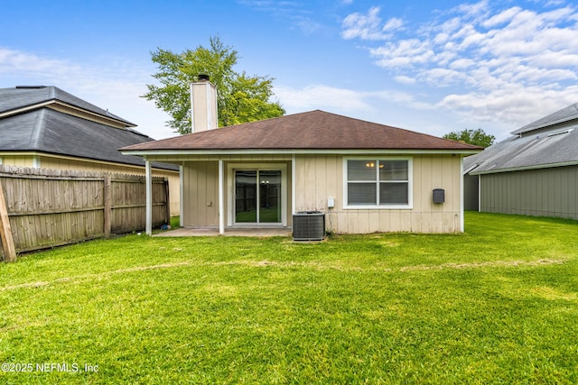 6719 Newgate Cir E, Jacksonville, FL 32244 - back of property featuring a chimney
