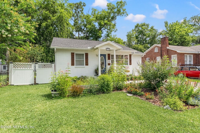 4737 College St, Jacksonville, FL 32205 - ranch-style home featuring a gate and roof with shingles