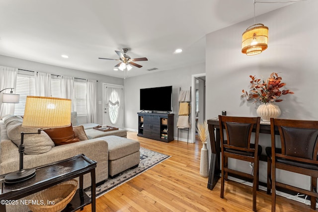 4737 College St, Jacksonville, FL 32205 - living room featuring light wood-type flooring, ceiling fan, and recessed lighting