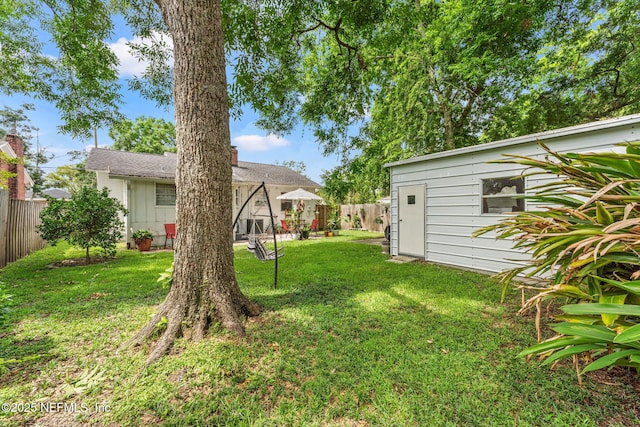 4737 College St, Jacksonville, FL 32205 - fenced backyard featuring an outdoor structure