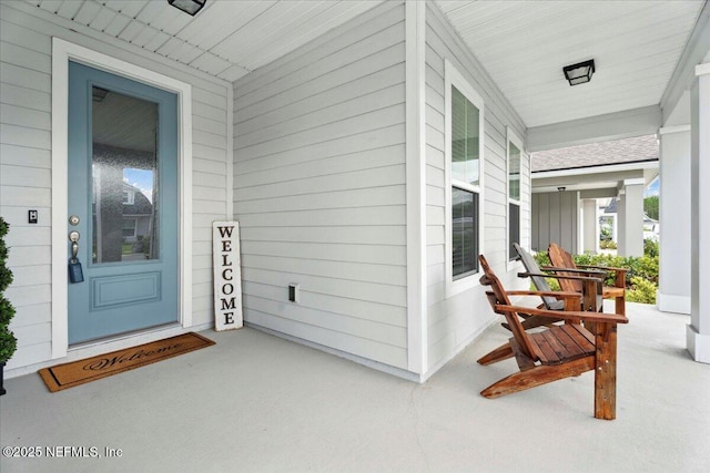 227 Wind Chime Ln, Saint Augustine, FL 32095 - doorway to property with a porch