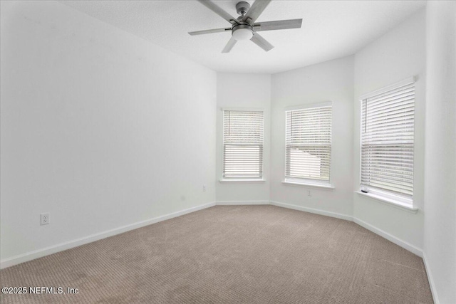 227 Wind Chime Ln, Saint Augustine, FL 32095 - empty room featuring carpet and a ceiling fan