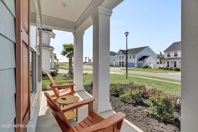 62 Seaside Vista Ct, Saint Augustine, FL 32084 - covered porch with a residential view