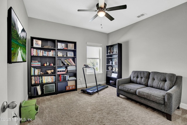 62 Seaside Vista Ct, Saint Augustine, FL 32084 - living area with carpet floors and a ceiling fan