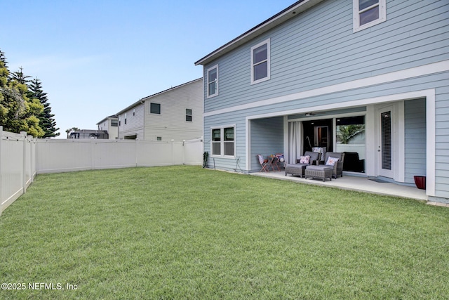 62 Seaside Vista Ct, Saint Augustine, FL 32084 - back of house featuring a fenced backyard, a patio, and an outdoor hangout area