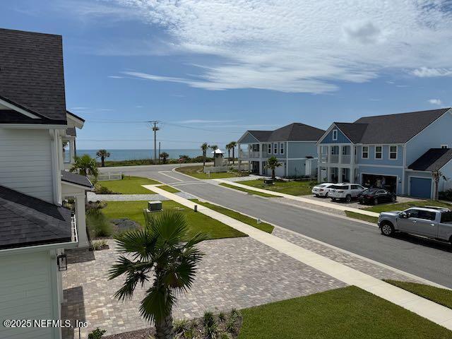 62 Seaside Vista Ct, Saint Augustine, FL 32084 - view of asphalt street featuring sidewalks and a residential view