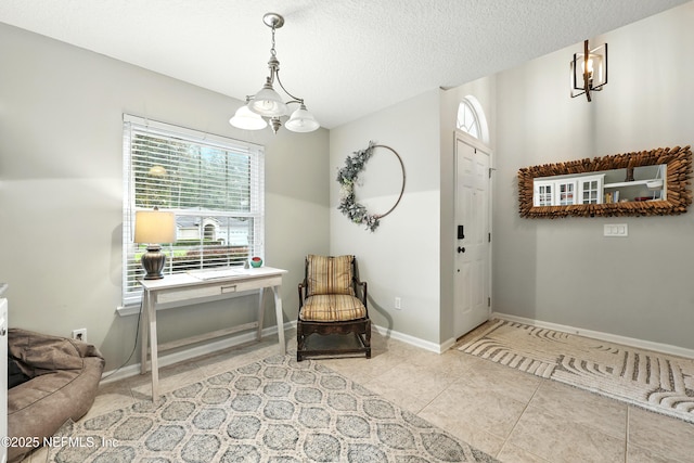 145 E Blackjack Branch Way, Saint Johns, FL 32259 - living area with a chandelier, healthy amount of natural light, tile patterned flooring, and a textured ceiling