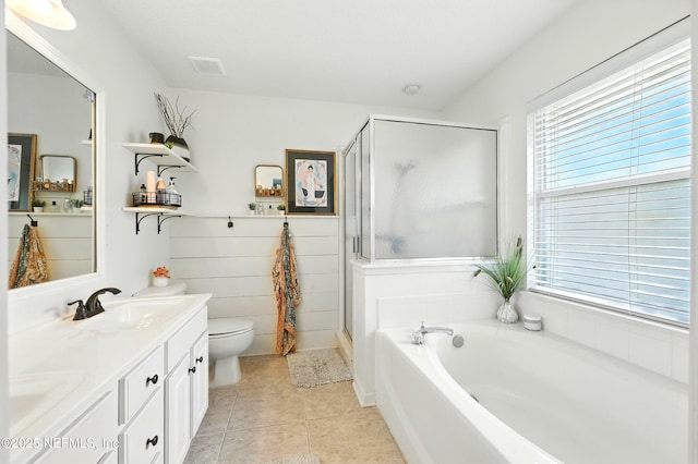 145 E Blackjack Branch Way, Saint Johns, FL 32259 - full bath with double vanity, a shower stall, a garden tub, and tile patterned flooring