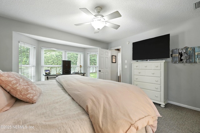 145 E Blackjack Branch Way, Saint Johns, FL 32259 - carpeted bedroom featuring multiple windows, ceiling fan, and a textured ceiling