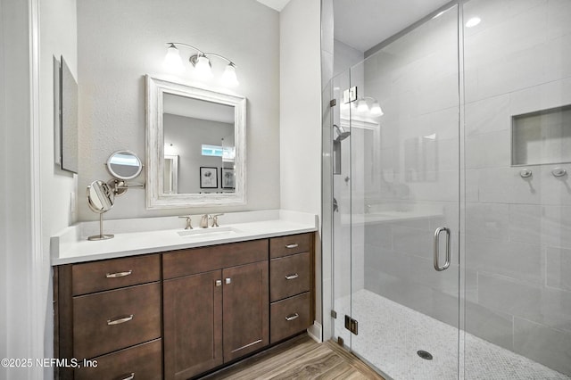 214 Gap Creek Dr, Saint Johns, FL 32259 - full bathroom with vanity, a shower stall, and wood finished floors