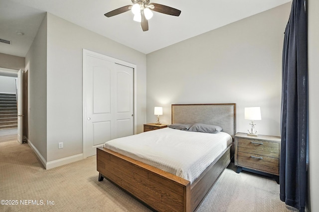 214 Gap Creek Dr, Saint Johns, FL 32259 - bedroom featuring light carpet, a closet, and a ceiling fan