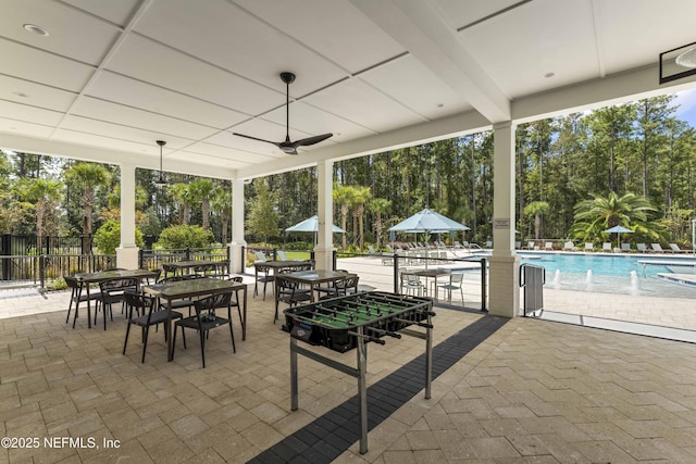 214 Gap Creek Dr, Saint Johns, FL 32259 - view of patio featuring a community pool, ceiling fan, and view of scattered trees