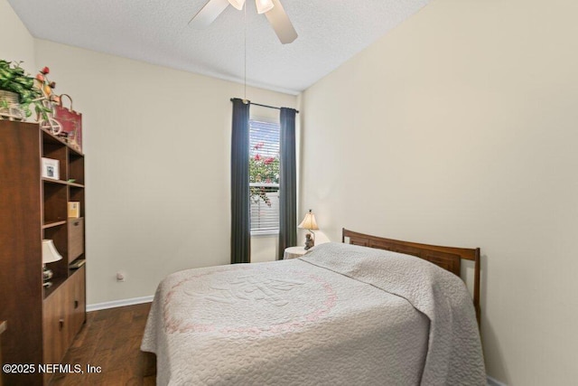 205 N Checkerberry Way, Saint Johns, FL 32259 - bedroom with dark wood finished floors, ceiling fan, and a textured ceiling