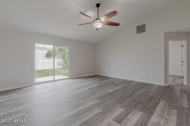 1203 Summer Springs Dr, Middleburg, FL 32068 - unfurnished room with vaulted ceiling, a ceiling fan, and wood finished floors