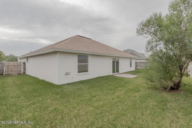 1203 Summer Springs Dr, Middleburg, FL 32068 - back of house with a shingled roof and stucco siding