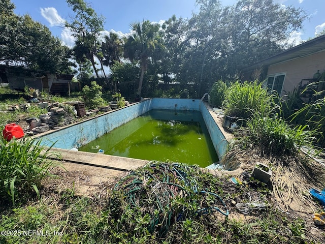 511 Clearview Dr, Cocoa, FL 32927 - view of pool featuring a garden pond