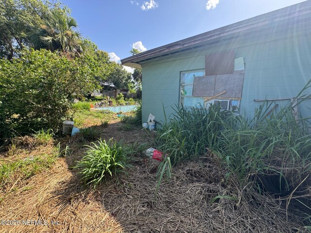 511 Clearview Dr, Cocoa, FL 32927 - view of side of property featuring concrete block siding