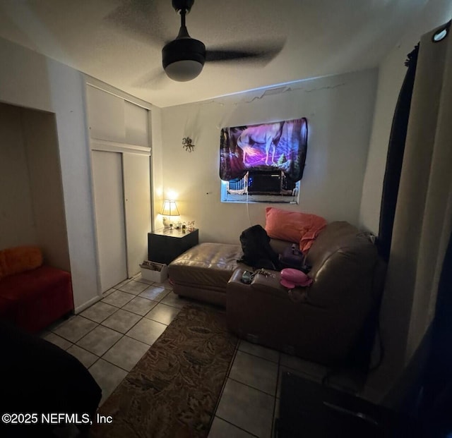 511 Clearview Dr, Cocoa, FL 32927 - living area with tile patterned flooring and a ceiling fan