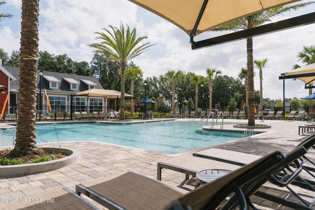 2692 Field Daisy Ln, Green Cove Springs, FL 32043 - community pool featuring a patio area