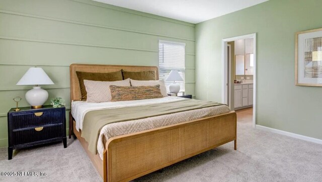 2692 Field Daisy Ln, Green Cove Springs, FL 32043 - carpeted bedroom with ensuite bath and baseboards