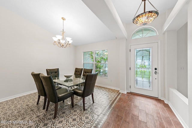 213 Seamist Ct, Ponte Vedra Beach, FL 32082 - dining area with a chandelier, plenty of natural light, and wood finished floors