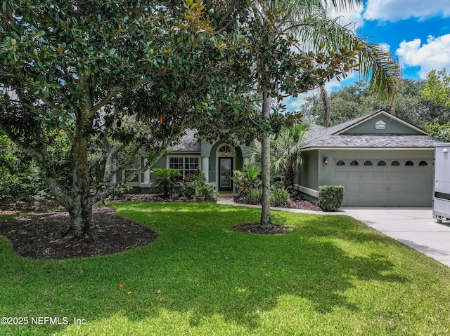 213 Seamist Ct, Ponte Vedra Beach, FL 32082 - view of front of property with driveway, a front lawn, a garage, and stucco siding