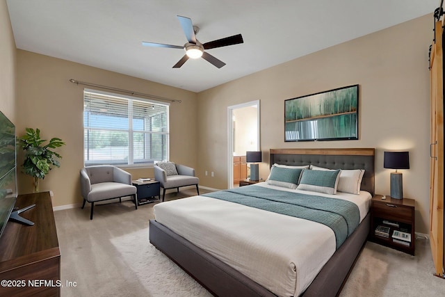 25122 Chipshot Ct, Sorrento, FL 32776 - carpeted bedroom with ensuite bathroom, a ceiling fan, and a barn door