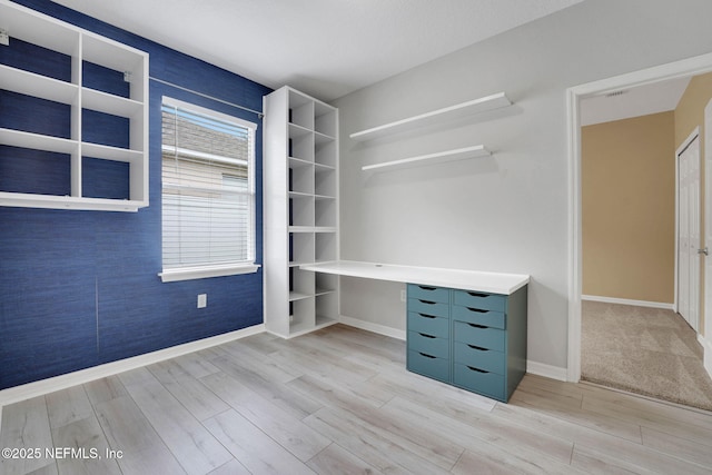 25122 Chipshot Ct, Sorrento, FL 32776 - walk in closet with wood finished floors